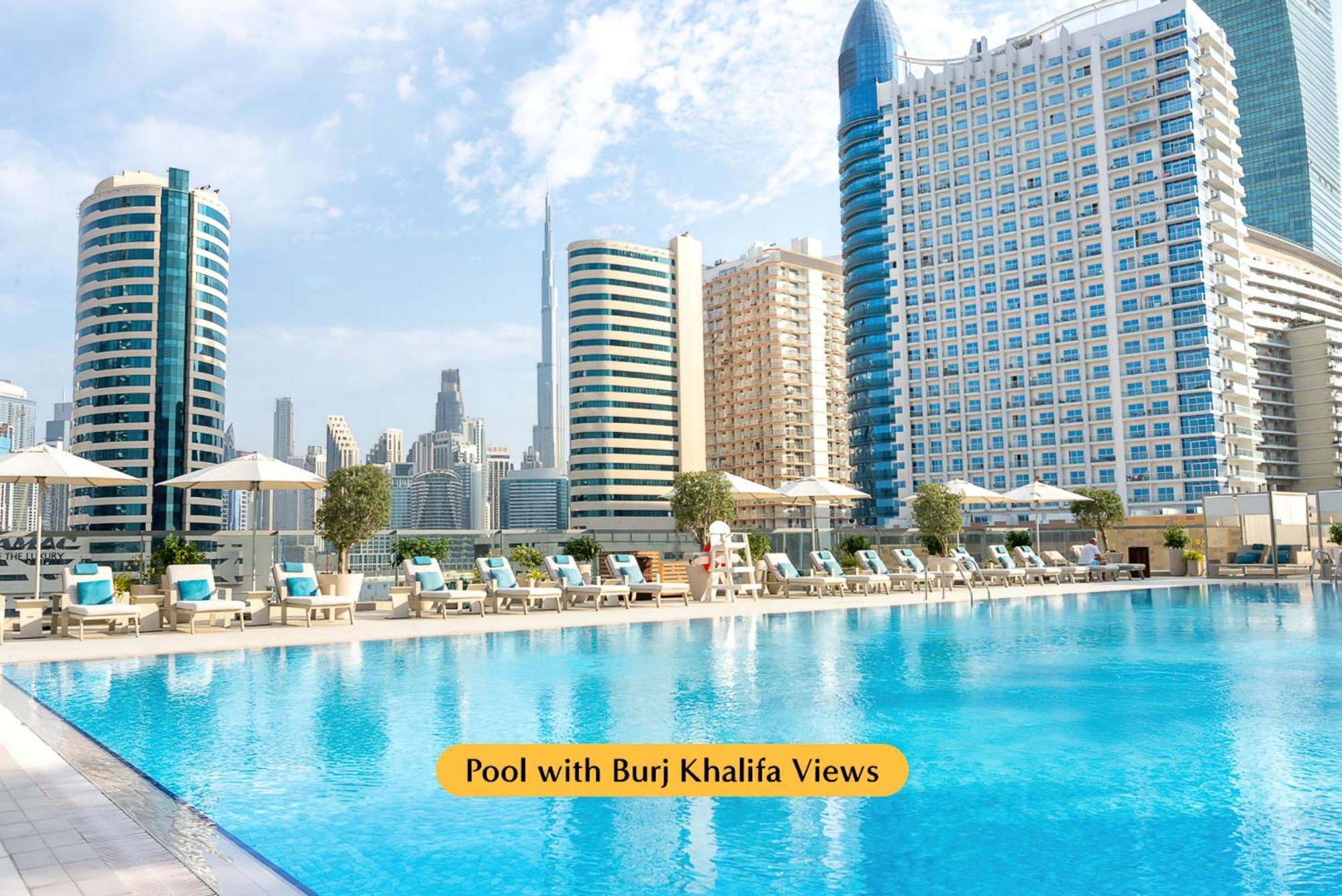 The First Collection Dubai Business Bay Hotel Exterior foto Pool with Burj Khalifa views