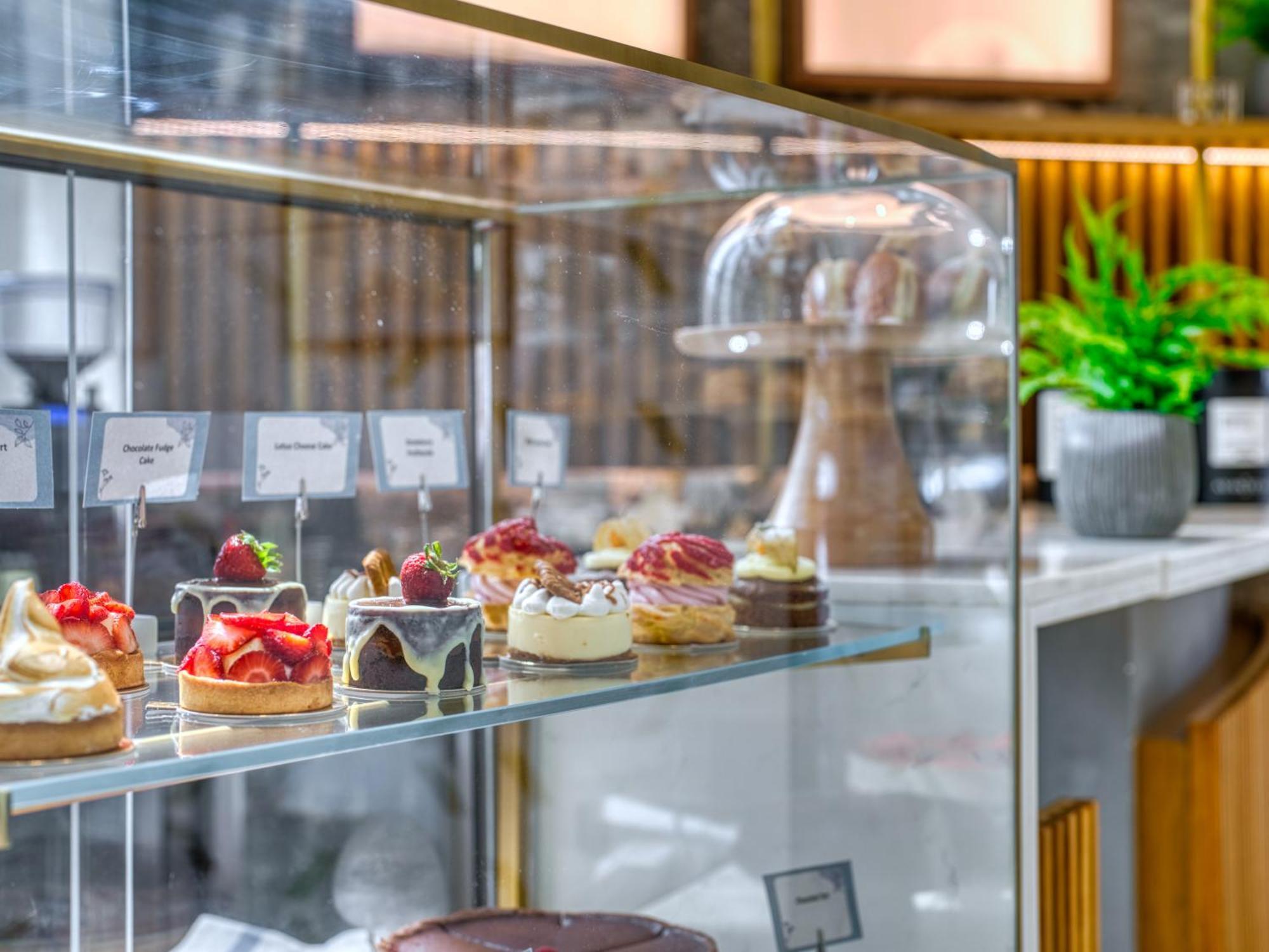 The First Collection Dubai Business Bay Hotel Exterior foto "The pastry shop is open for business"